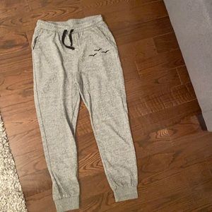 Salt and pepper grey with black logo lazy pants in size women’s large!